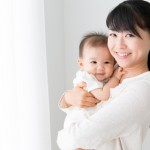asian baby and mother relaxing
